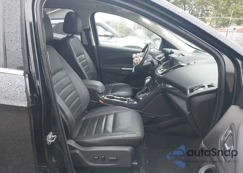 2015 Ford Escape Titanium z USA, uszkodzony, nr VIN 1FMCU9J90FUA39185